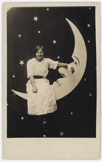 (PAPER MOONS) A magnificent collection of 30 paper moon real photo postcards featuring an array of charmingly posed sitters, perched